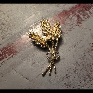 Gold Chanel brooch pin